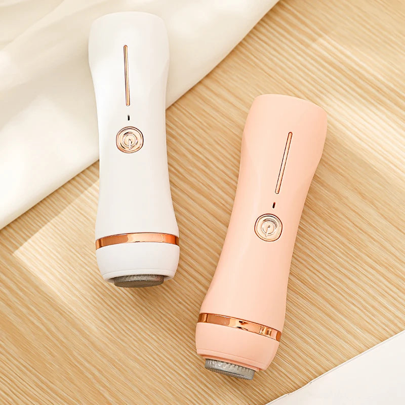Rolli™ SmoothPro MultiCare electric foot grinders in white and pink – professional foot callus remover and electric foot file with multiple replacement roller heads, designed for smooth, soft feet and effective dead skin removal, perfect pedicure tool for daily foot care